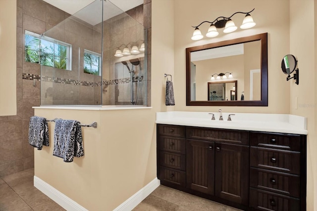 15415 Mulholland Rd, Parrish, FL 34219 - full bath featuring a walk in shower, vanity, tile patterned flooring, and baseboards