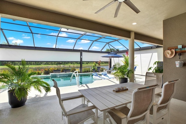 15415 Mulholland Rd, Parrish, FL 34219 - view of patio / terrace with ceiling fan, glass enclosure, an outdoor pool, and outdoor dining area