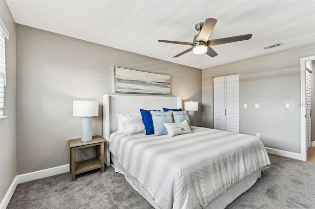 2960 59th St S Unit 303, Gulfport, FL 33707 - bedroom with baseboards, carpet, and a closet