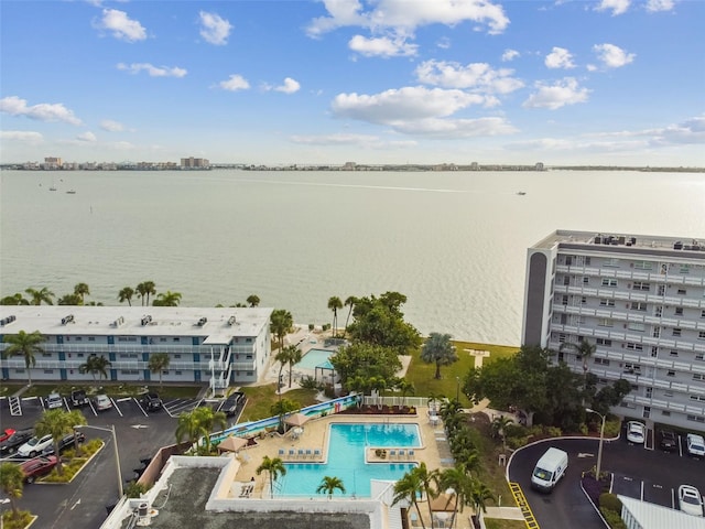 2960 59th St S Unit 303, Gulfport, FL 33707 - drone / aerial view of a pool, a nearby body of water, and apartment complex / building