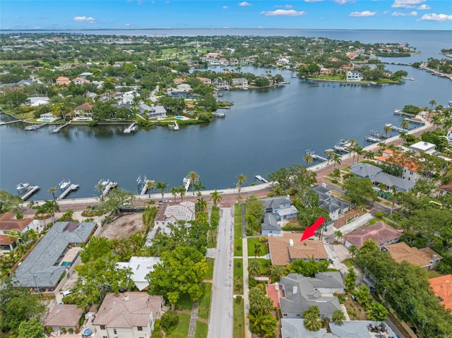 146 26th Ave NE, Saint Petersburg, FL 33704 - aerial view of property and surrounding area featuring a nearby body of water and nearby suburban area