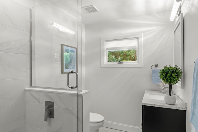 146 26th Ave NE, Saint Petersburg, FL 33704 - full bath featuring vanity, toilet, and an enclosed shower