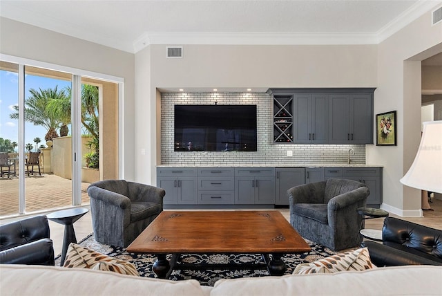 100 Beach Dr NE Unit 301, Saint Petersburg, FL 33701 - living area with ornamental molding and light wood-type flooring