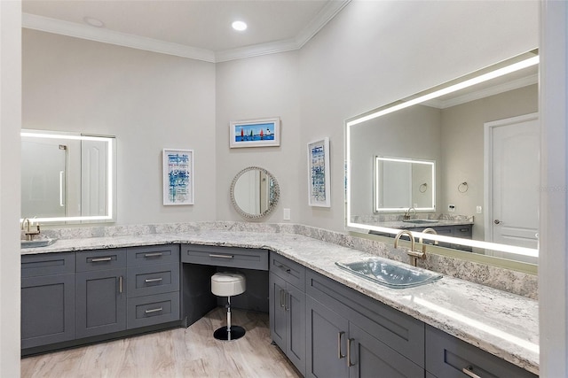 100 Beach Dr NE Unit 301, Saint Petersburg, FL 33701 - bathroom with crown molding and double vanity