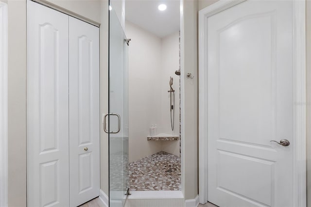 100 Beach Dr NE Unit 301, Saint Petersburg, FL 33701 - bathroom featuring a shower stall, a closet, and recessed lighting