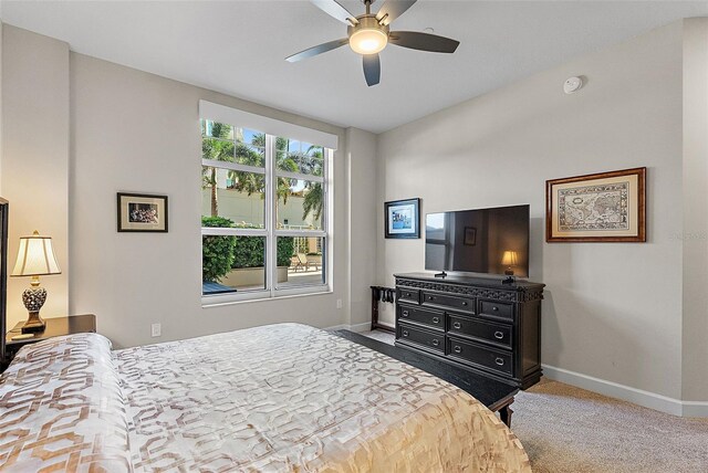 100 Beach Dr NE Unit 301, Saint Petersburg, FL 33701 - carpeted bedroom featuring baseboards and a ceiling fan