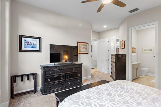 100 Beach Dr NE Unit 301, Saint Petersburg, FL 33701 - bedroom featuring baseboards, light carpet, ensuite bath, recessed lighting, and ceiling fan