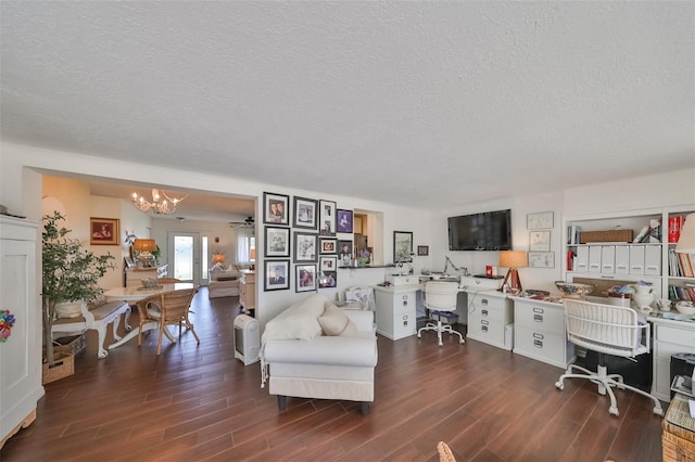 1224 W Del Webb Blvd, Sun City Center, FL 33573 - home office featuring wood finished floors, a textured ceiling, a chandelier, and built in desk