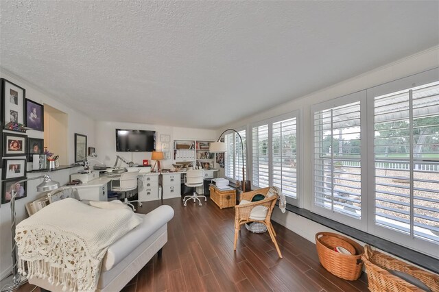 1224 W Del Webb Blvd, Sun City Center, FL 33573 - living room featuring dark wood-style floors, a textured ceiling, and built in study area