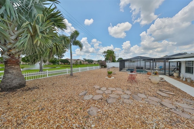 1224 W Del Webb Blvd, Sun City Center, FL 33573 - fenced backyard with a lanai