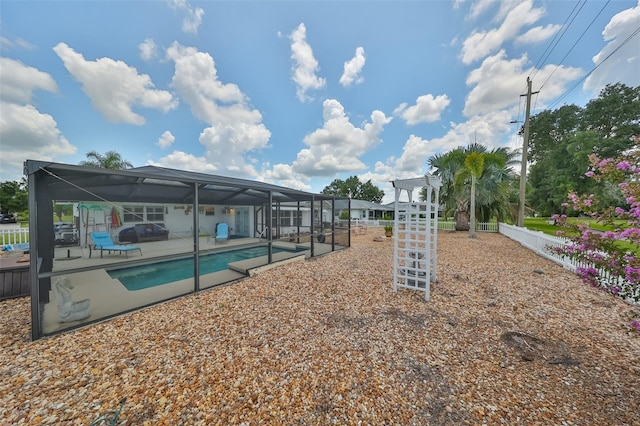 1224 W Del Webb Blvd, Sun City Center, FL 33573 - outdoor pool with a patio area and glass enclosure