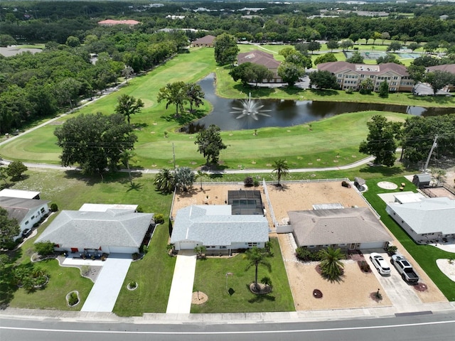 1224 W Del Webb Blvd, Sun City Center, FL 33573 - aerial perspective of suburban area with a large body of water and a local golf course