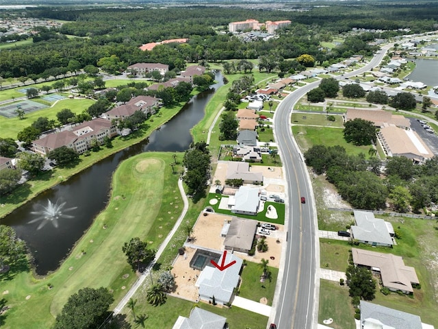 1224 W Del Webb Blvd, Sun City Center, FL 33573 - aerial overview of property's location featuring a large body of water and nearby suburban area
