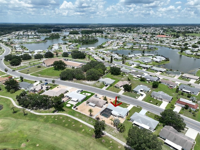 1224 W Del Webb Blvd, Sun City Center, FL 33573 - aerial view of property and surrounding area with nearby suburban area