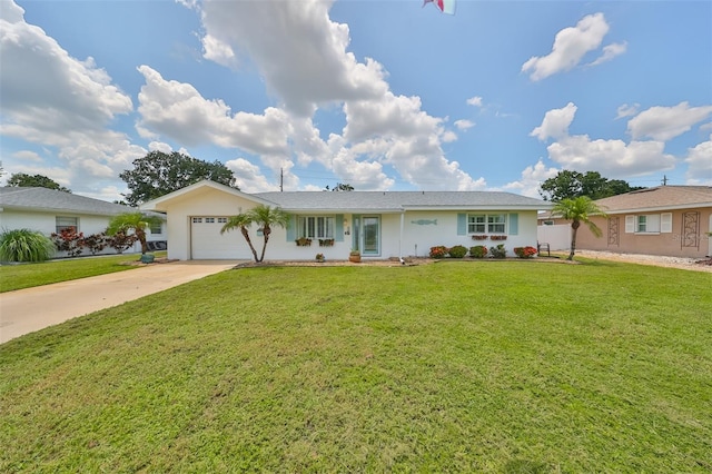 1224 W Del Webb Blvd, Sun City Center, FL 33573 - ranch-style house featuring an attached garage, concrete driveway, a front yard, and stucco siding