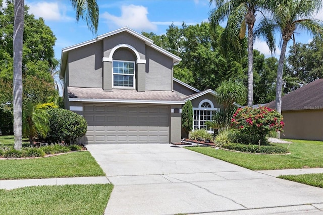 4047 Eagle Cove W Dr, Palm Harbor, FL 34685 - traditional-style house with stucco siding, driveway, a garage, and a front yard
