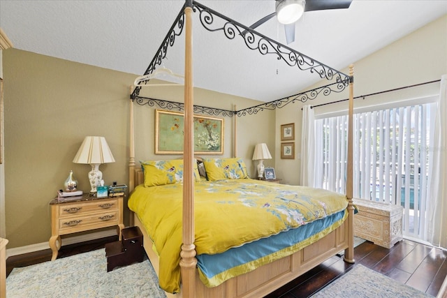 4047 Eagle Cove W Dr, Palm Harbor, FL 34685 - bedroom with vaulted ceiling, wood finished floors, and a ceiling fan