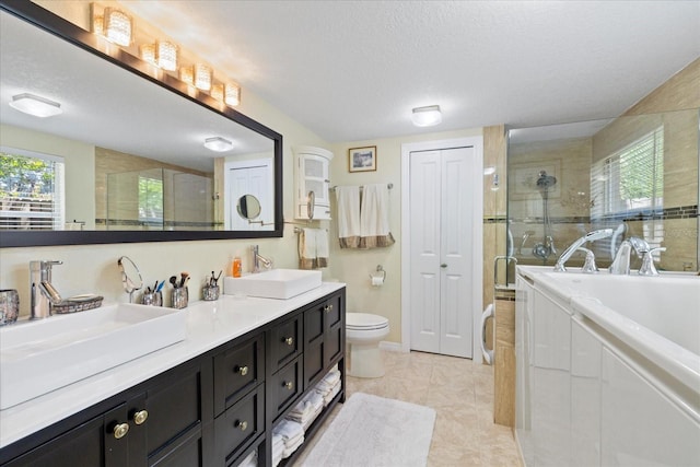 4047 Eagle Cove W Dr, Palm Harbor, FL 34685 - full bathroom featuring a shower stall, double vanity, a bath, and a textured ceiling