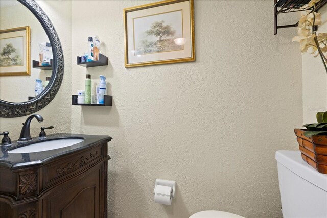 4047 Eagle Cove W Dr, Palm Harbor, FL 34685 - bathroom featuring toilet and vanity