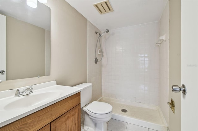 3389 Crystal Ct E J, Unit J, Palm Harbor, FL 34685 - full bath with toilet, tiled shower, vanity, and tile patterned flooring