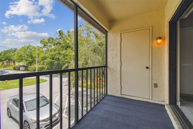 3389 Crystal Ct E J, Unit J, Palm Harbor, FL 34685 - balcony featuring view of wooded area