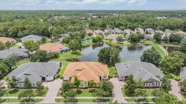 27427 Mistflower Dr, Wesley Chapel, FL 33544 - aerial view of residential area featuring a nearby body of water and a forest