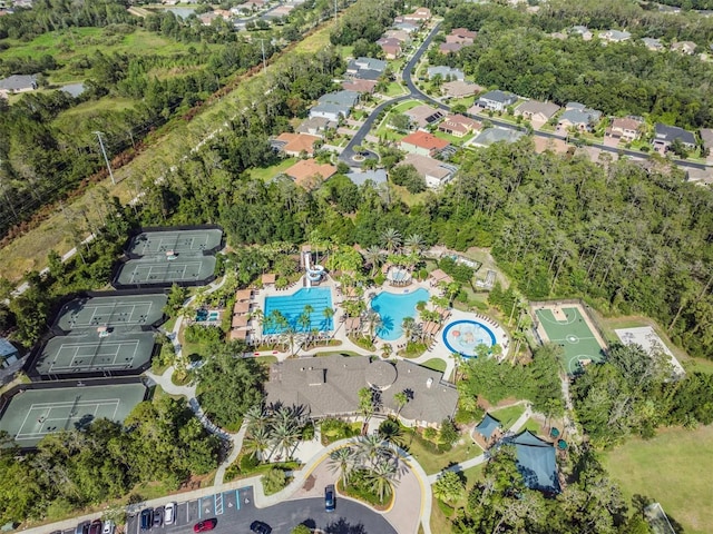 27427 Mistflower Dr, Wesley Chapel, FL 33544 - aerial overview of property's location with a pool area