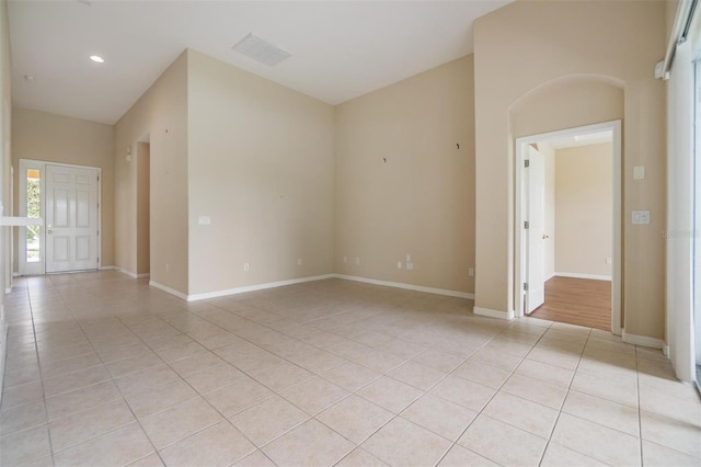 27427 Mistflower Dr, Wesley Chapel, FL 33544 - spare room featuring light tile patterned flooring, baseboards, and recessed lighting