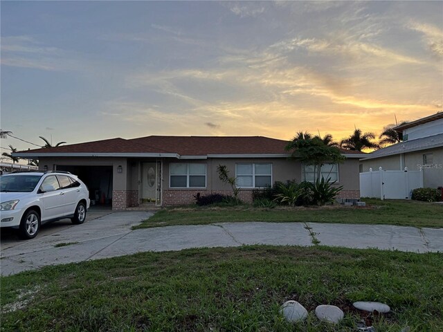 6820 26th St W, Bradenton, FL 34207 - ranch-style house featuring brick siding, driveway, and an attached garage