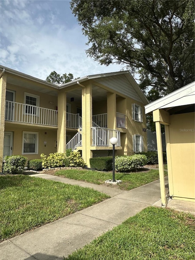 1408 Millstream Ln Unit 206, Dunedin, FL 34698 - view of property with stairs