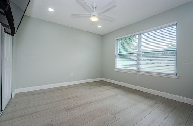 7547 Landmark Dr, Spring Hill, FL 34606 - unfurnished room with light wood-type flooring, a ceiling fan, and recessed lighting