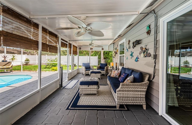 7547 Landmark Dr, Spring Hill, FL 34606 - sunroom featuring ceiling fan and an outdoor hangout area