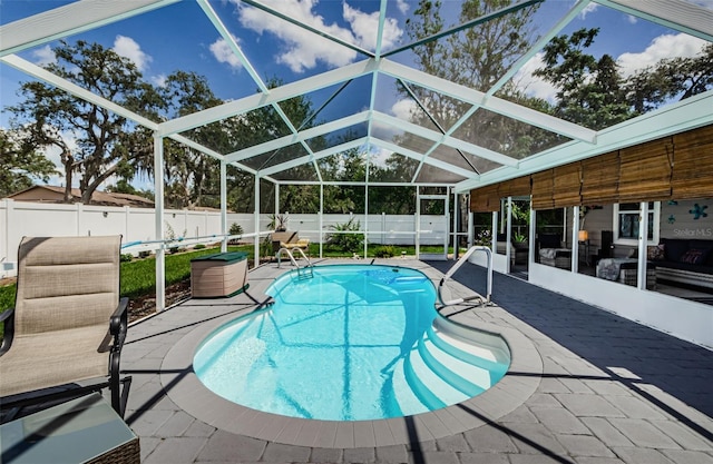 7547 Landmark Dr, Spring Hill, FL 34606 - view of swimming pool with a patio area, a fenced backyard, and glass enclosure
