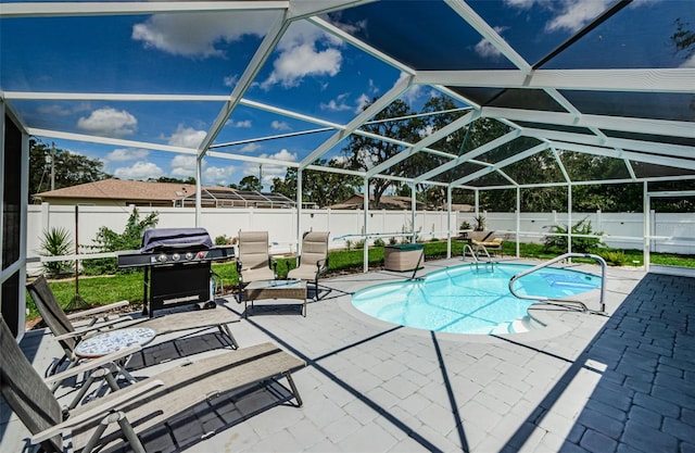 7547 Landmark Dr, Spring Hill, FL 34606 - view of pool featuring a grill, a patio area, a fenced backyard, and a lanai