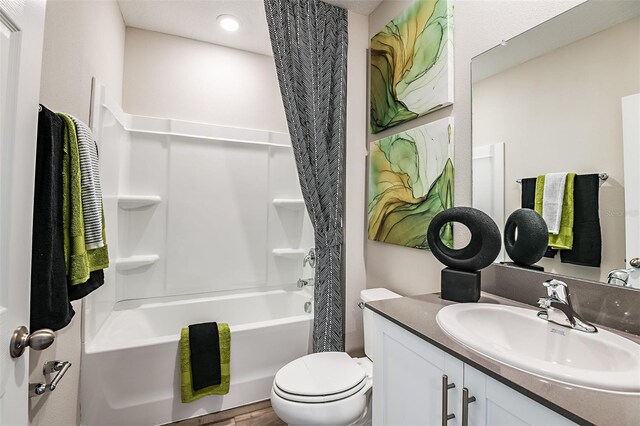 1217 Tidal St, Haines City, FL 33844 - bathroom with vanity, shower / tub combo, and toilet