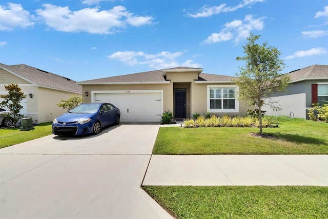3628 Diving Dove Ln, Bartow, FL 33830 - ranch-style house featuring a garage, stucco siding, concrete driveway, and a front lawn
