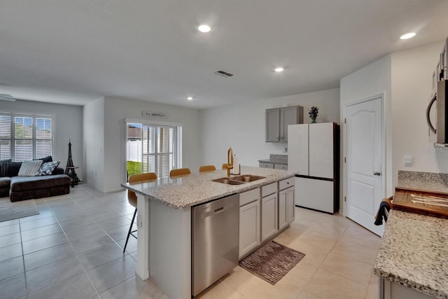 3628 Diving Dove Ln, Bartow, FL 33830 - kitchen with appliances with stainless steel finishes, a sink, open floor plan, healthy amount of natural light, and recessed lighting