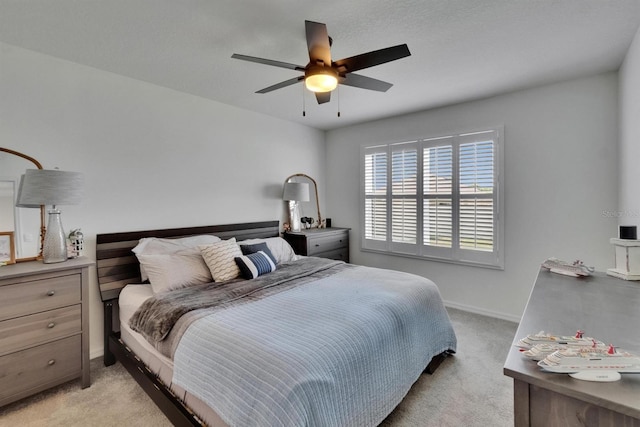 3628 Diving Dove Ln, Bartow, FL 33830 - bedroom with light carpet, baseboards, and ceiling fan