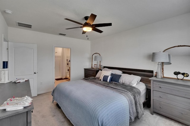 3628 Diving Dove Ln, Bartow, FL 33830 - bedroom featuring light carpet, a ceiling fan, and ensuite bathroom