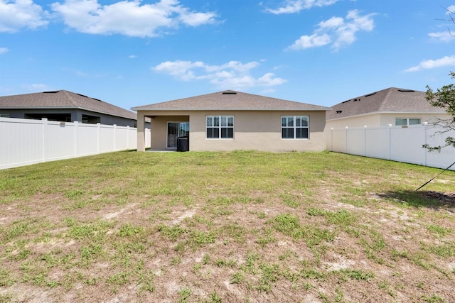 3628 Diving Dove Ln, Bartow, FL 33830 - rear view of house with stucco siding