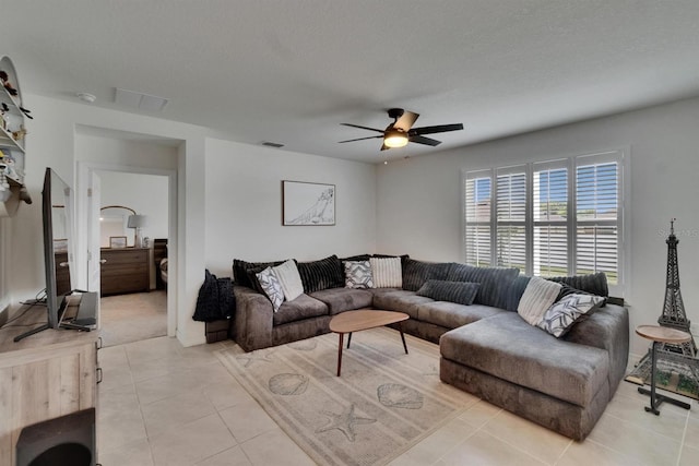 3628 Diving Dove Ln, Bartow, FL 33830 - living room with light tile patterned floors and a ceiling fan