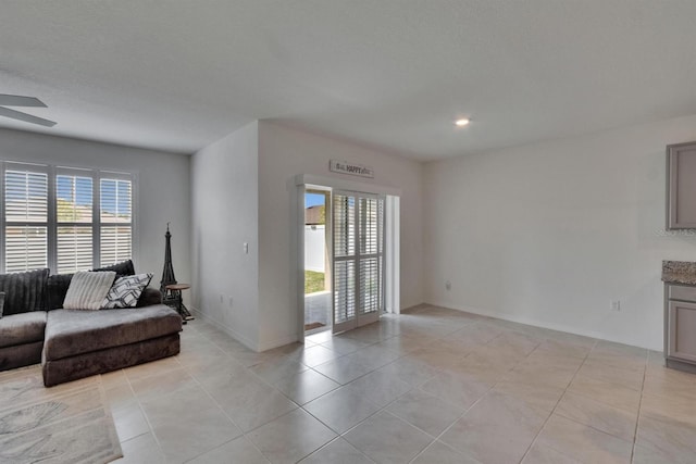 3628 Diving Dove Ln, Bartow, FL 33830 - living area featuring healthy amount of natural light, light tile patterned flooring, ceiling fan, and recessed lighting