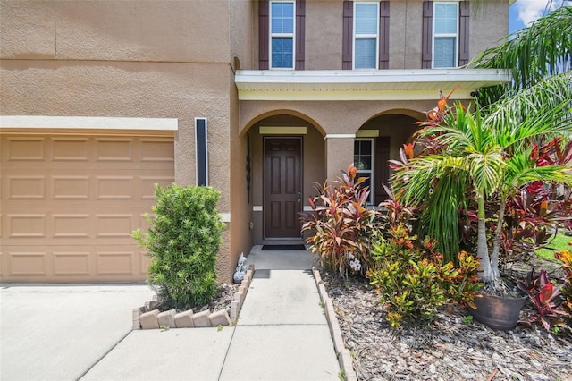 10512 Scenic Hollow Dr, Riverview, FL 33578 - entrance to property featuring stucco siding and a garage