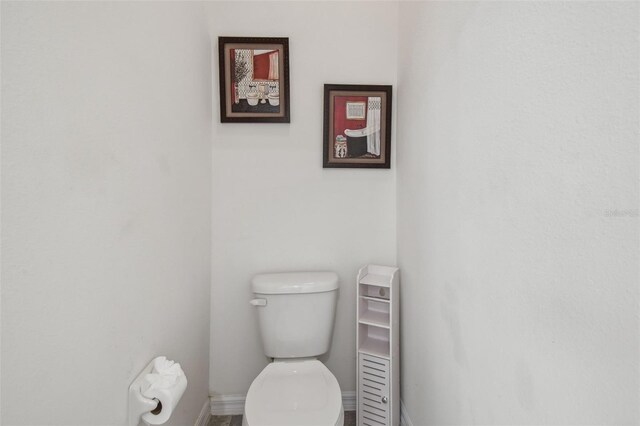 10512 Scenic Hollow Dr, Riverview, FL 33578 - bathroom with toilet and baseboards