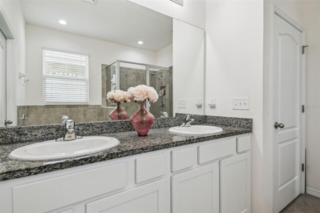 10512 Scenic Hollow Dr, Riverview, FL 33578 - bathroom with double vanity, a stall shower, and recessed lighting