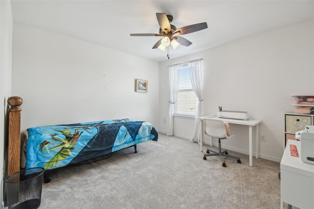 10512 Scenic Hollow Dr, Riverview, FL 33578 - carpeted bedroom with baseboards and ceiling fan