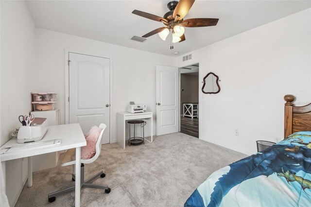 10512 Scenic Hollow Dr, Riverview, FL 33578 - bedroom with carpet flooring, an office area, a ceiling fan, and baseboards