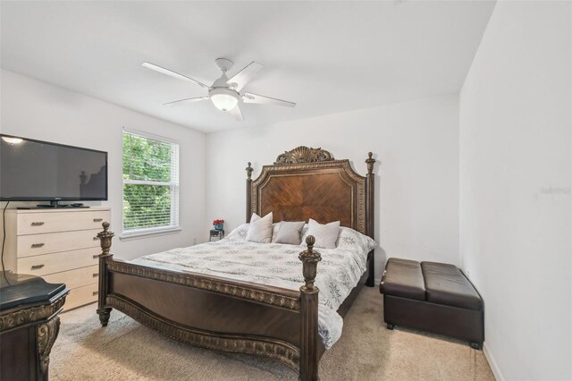 10512 Scenic Hollow Dr, Riverview, FL 33578 - bedroom with light colored carpet and a ceiling fan