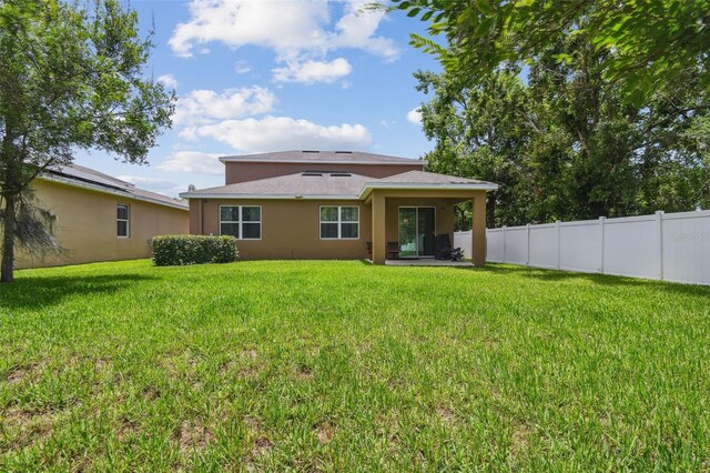 10512 Scenic Hollow Dr, Riverview, FL 33578 - back of house with stucco siding