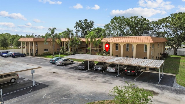 4500 E Bay Dr Unit 106, Clearwater, FL 33764 - view of partially covered parking lot